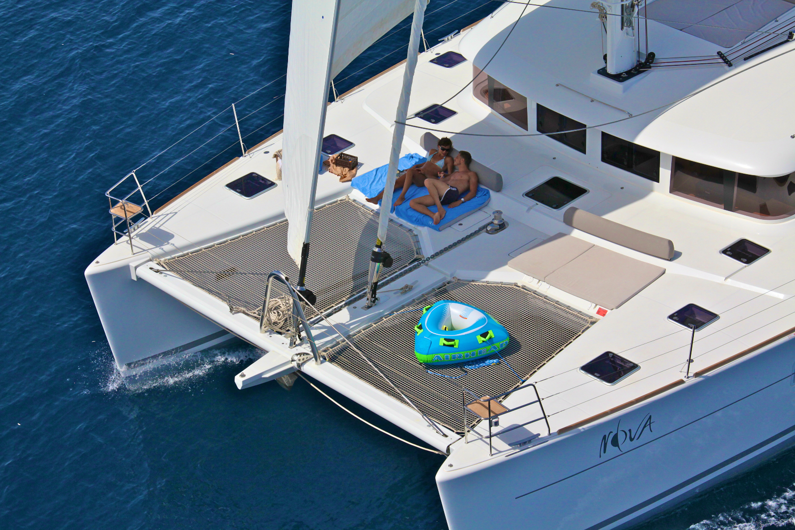 couple-sunbathing-on-luxury-yacht-Nova