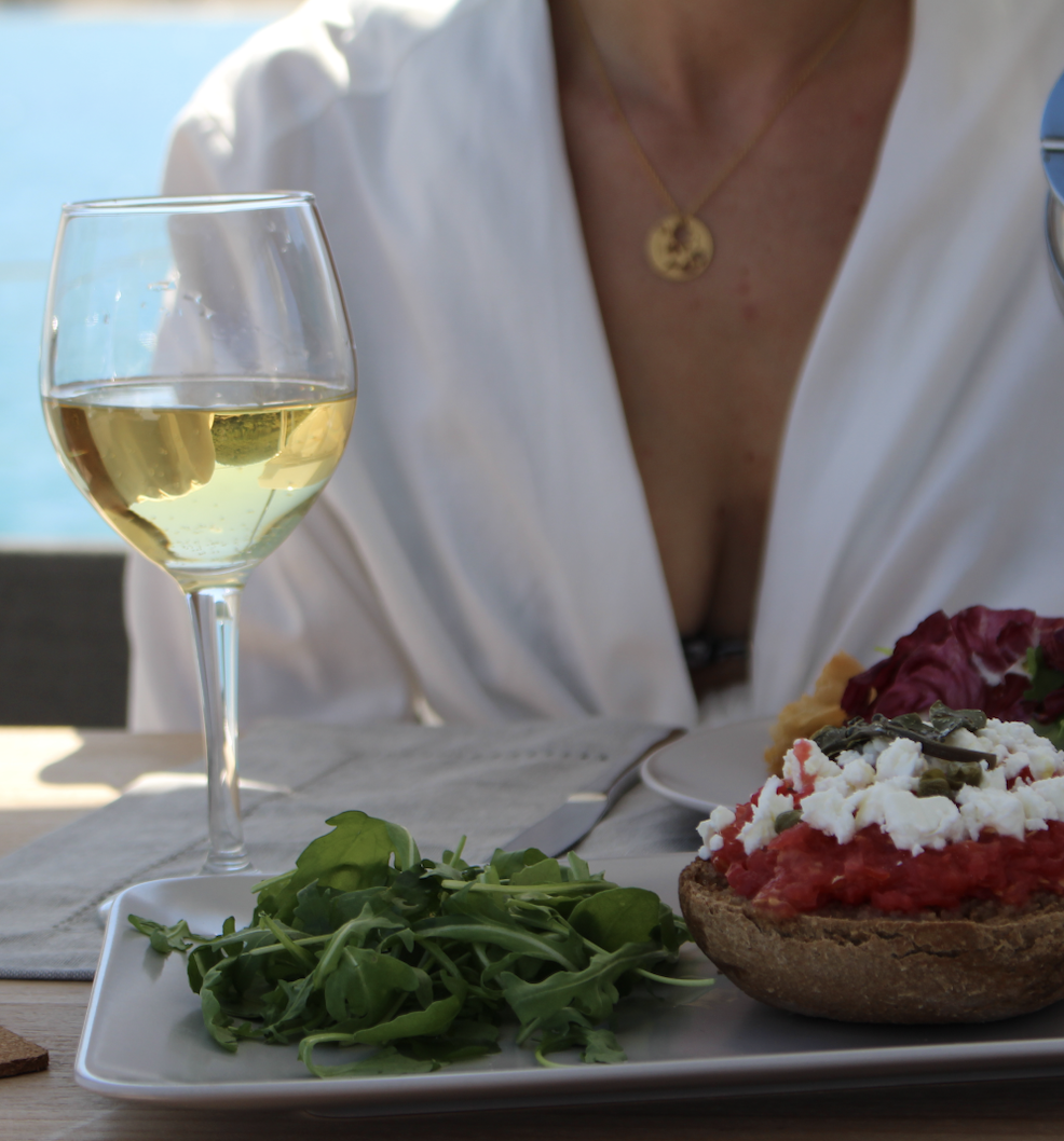 wine-and-salad-in-front-of-women